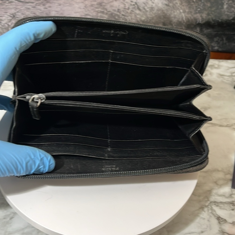 Prada Black Saffiano Leather Zip Wallet in GUC. - Picture 9 of 17